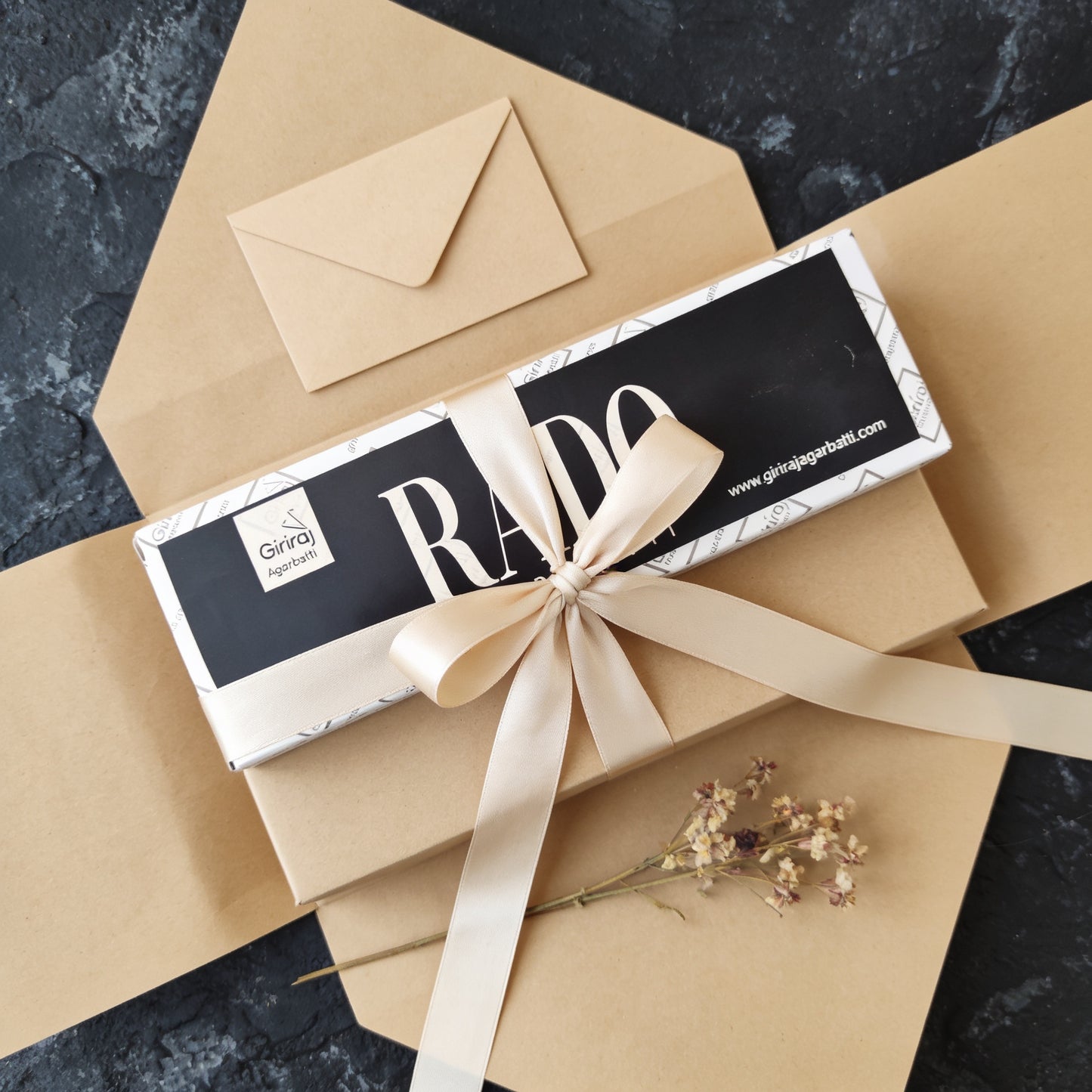 Rado Agarbatti incense gift wrapped with a satin ribbon
