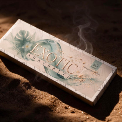 Exotic agarbatti box on warm sand in golden light