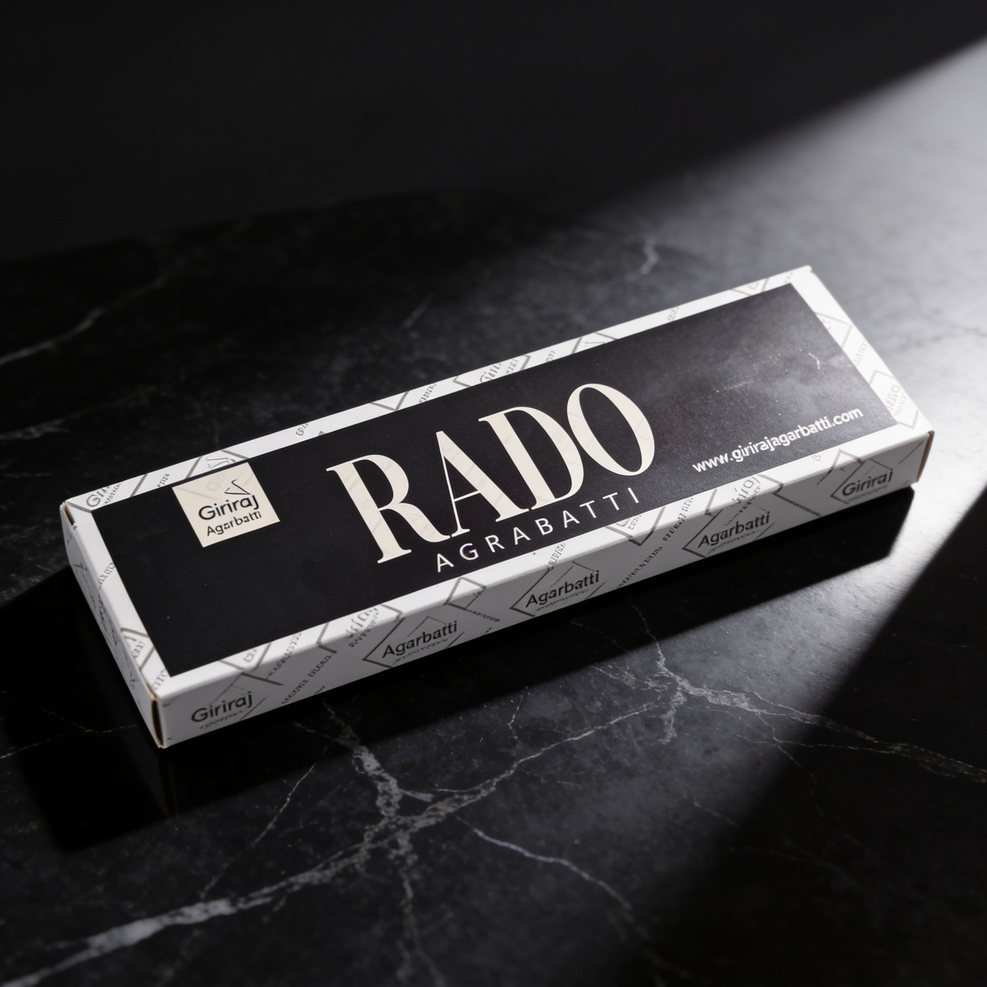 Rado Agarbatti incense box on black marble