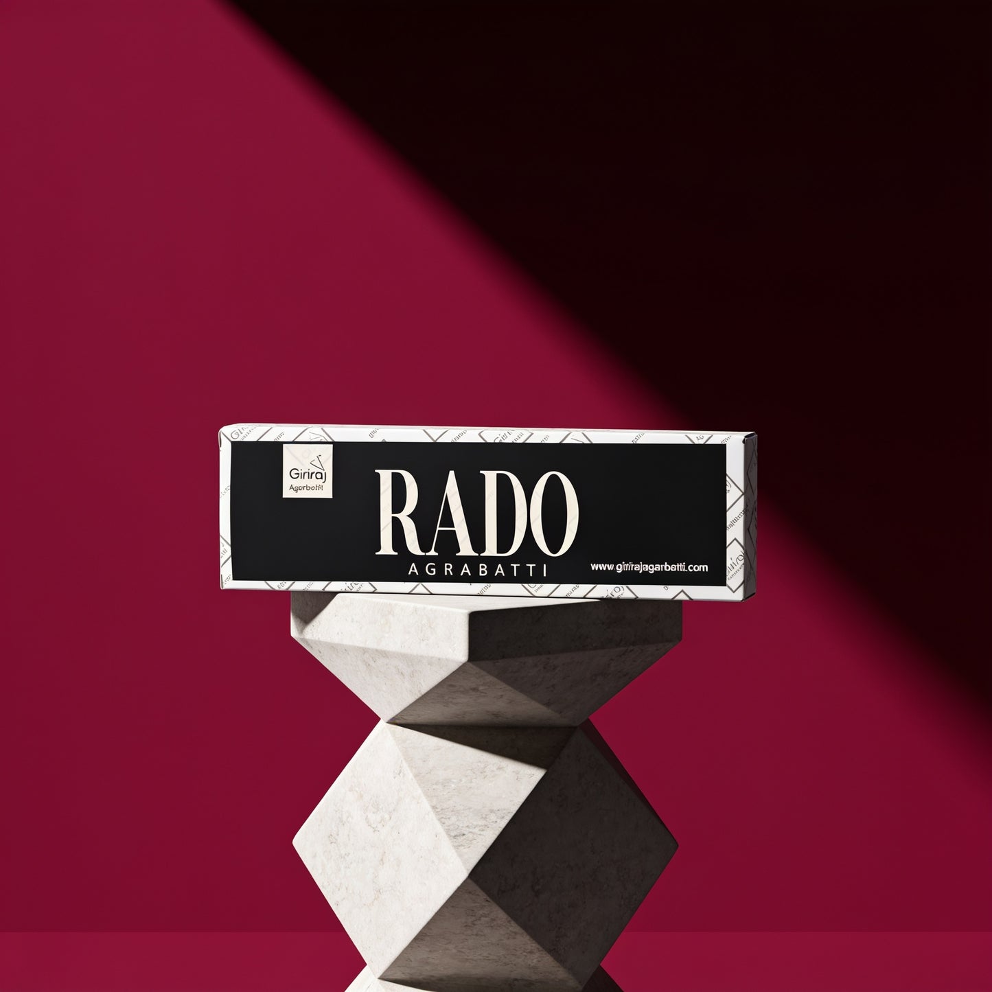 Rado Agarbatti premium luxury incense box by Giriraj on a sculptural pedestal