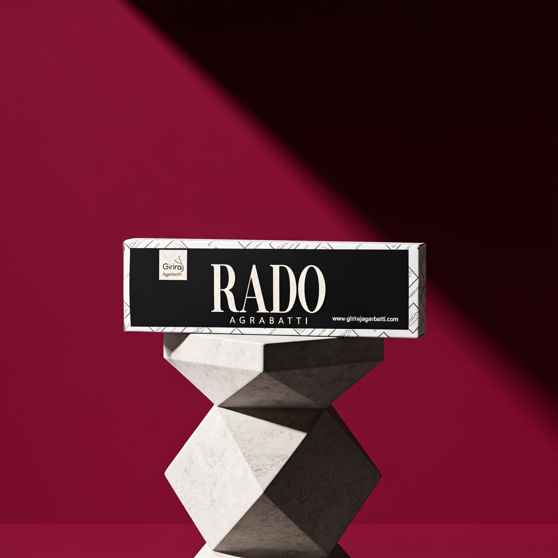 Rado Agarbatti premium luxury incense box by Giriraj on a sculptural pedestal