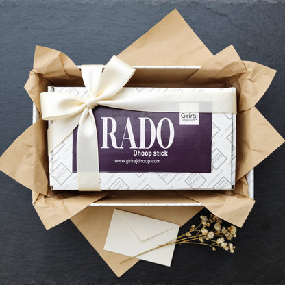 Rado Dhoop Stick gift wrapped with a satin ribbon